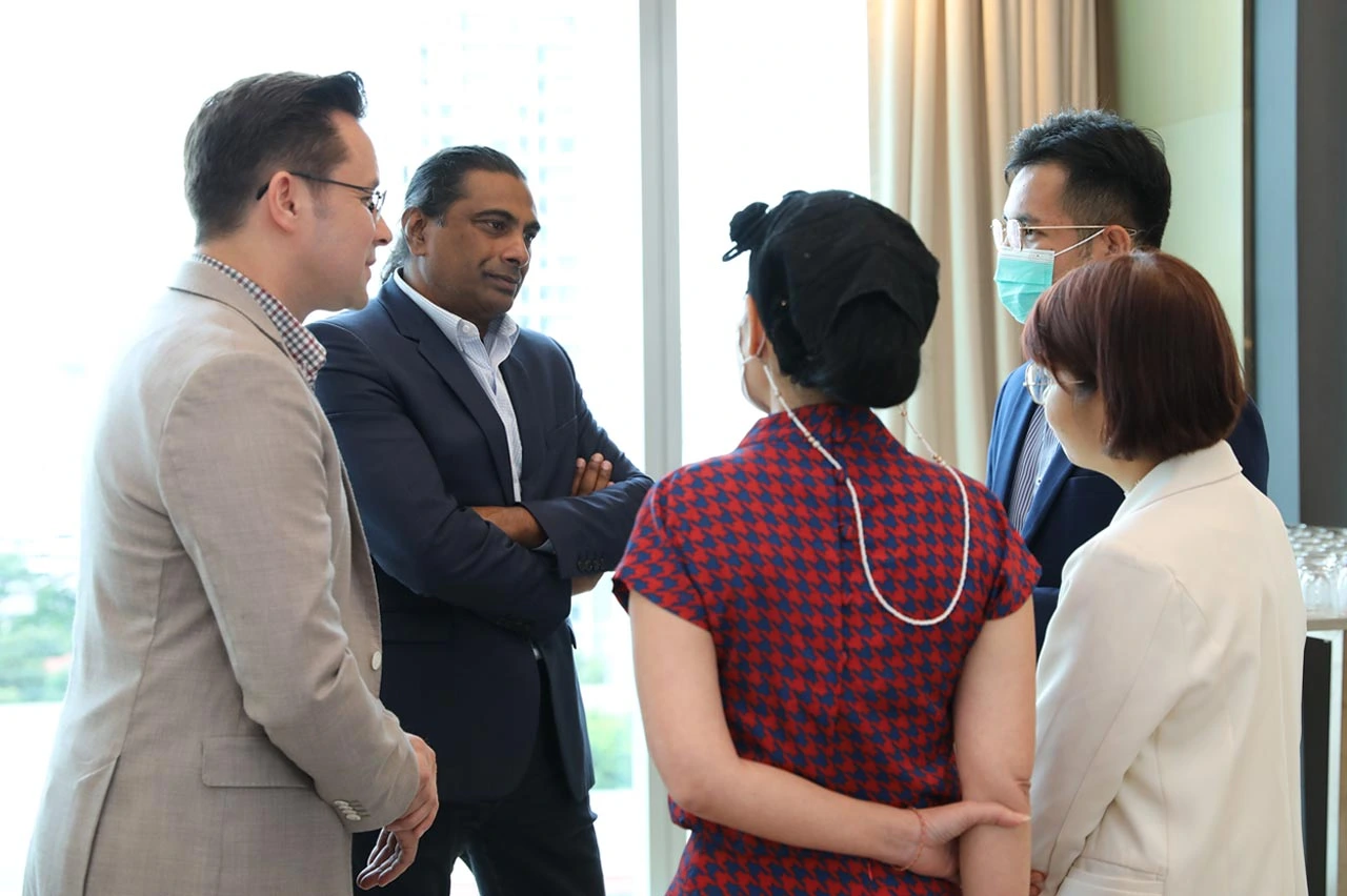 Dr. Rubin Pillay with fans after a keynote speech